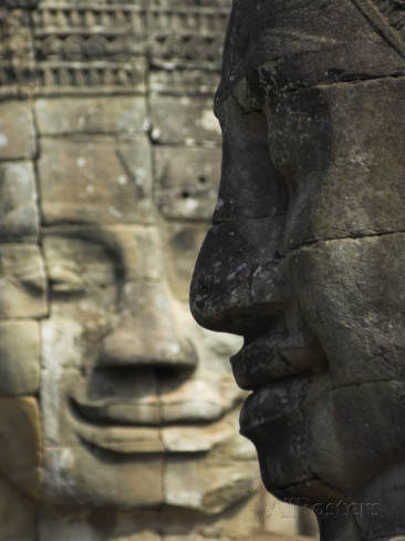 eitan-simanor-stone-statuary-of-human-faces-ta-prohm-temple-angkor-siem-reap[1].jpg